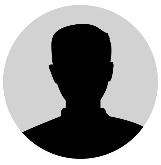 Eine unbekannte Person als Silhouette vor grauem Hintergrund, keine erkennbaren Details.